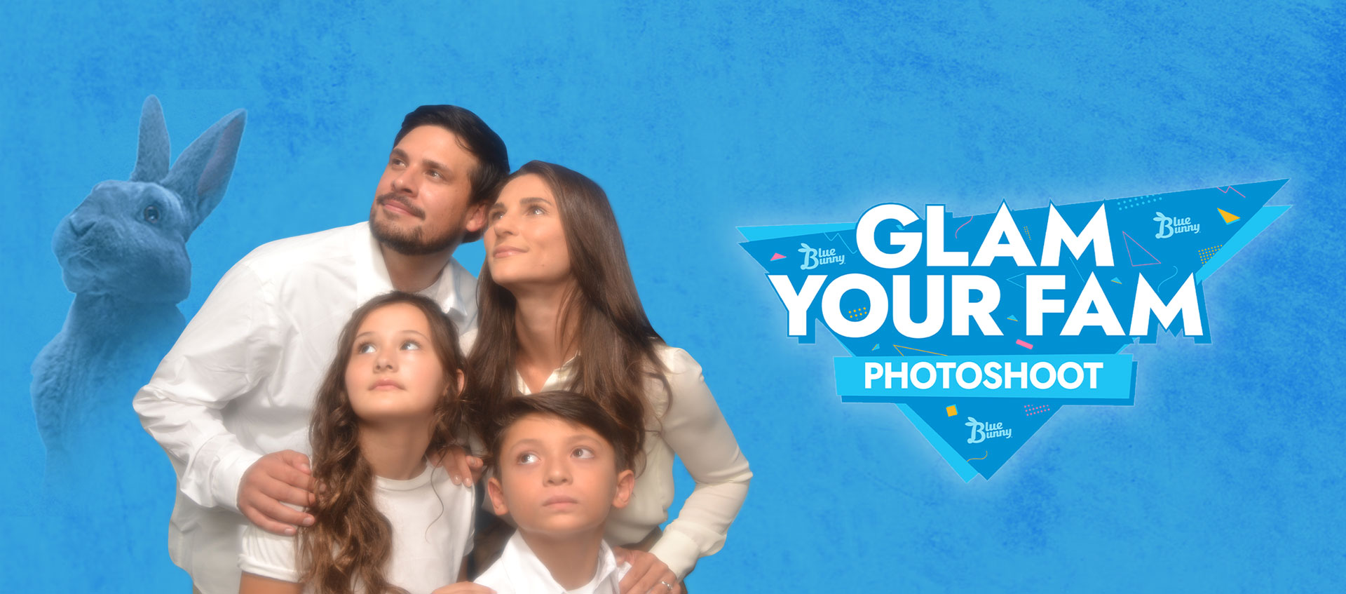 A mom, dad, brother, and sister staring off into the distance. Blu is also staring off into the distance. Glam your fam photosho logo to the right of them